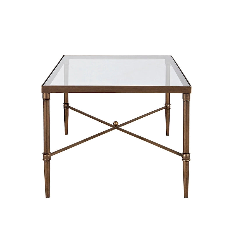 Table basse avec plateau en verre et piètement en X en bronze