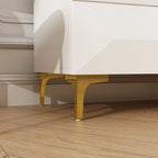 Commode haute asymétrique blanche avec pieds dorés