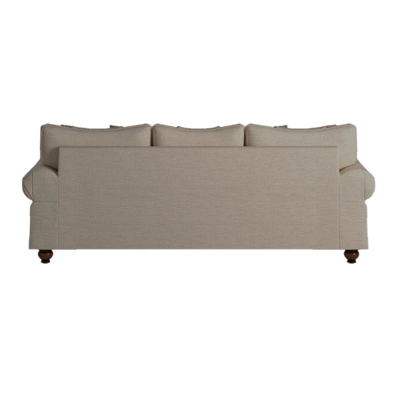 Canapé traditionnel beige clouté, 3 places